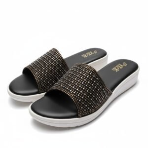 The black strap is heavily embellished with gold and silver